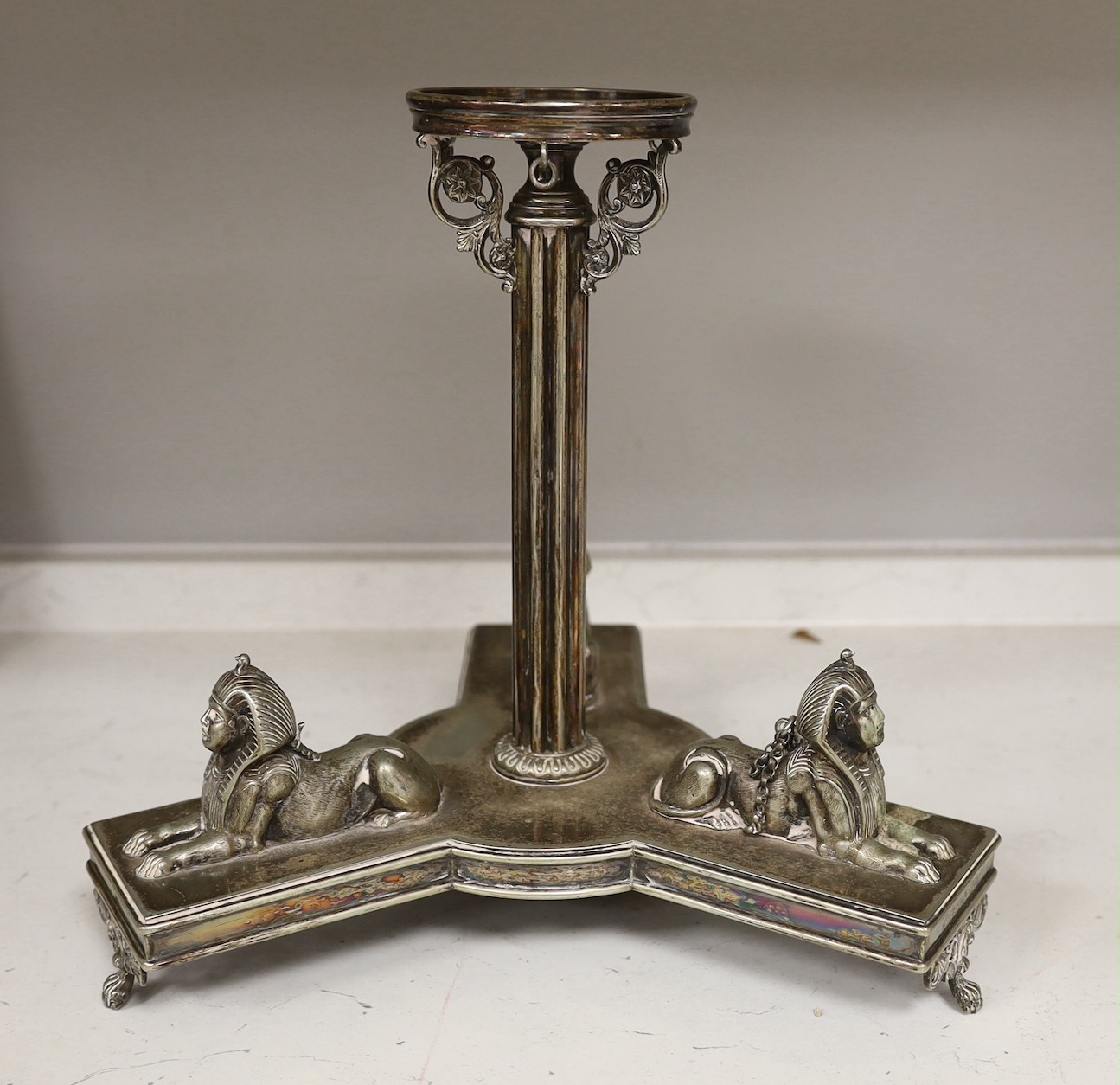 A silver plated sphinx epergne stand and other mixed plated wares